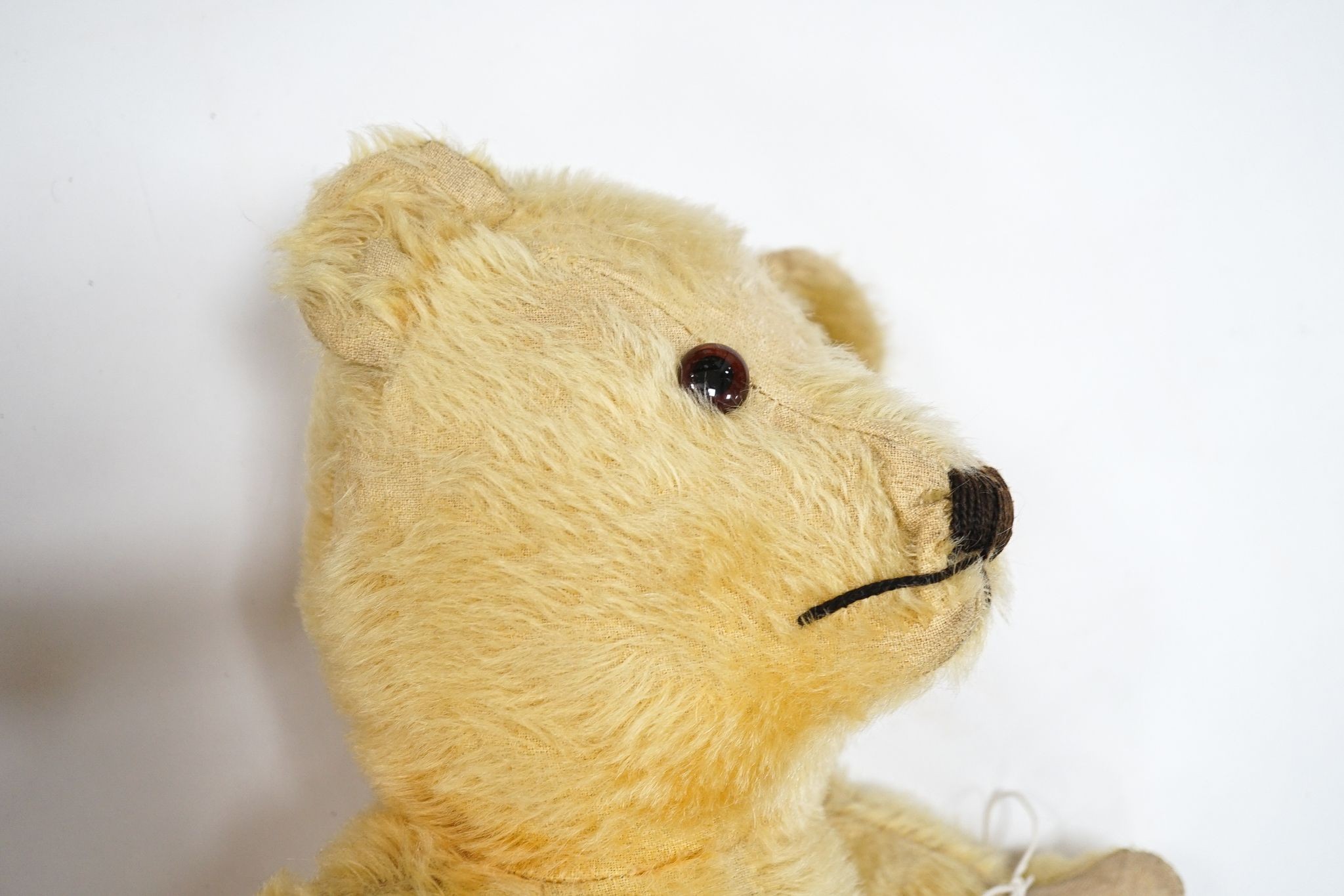 Wendy Boston, 24in. with label, good condition, together with a Deans with label, 18in., good condition and an unjointed 1950's English bear, 19in.